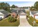 Charming single Gathering home featuring brick accents, attached two-car garage, and well-maintained landscaping at 658 Pamlico Ct., Myrtle Beach, SC 29588