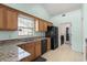 Bright and airy kitchen area with a charming breakfast nook offering views of the surrounding neighborhood at 658 Pamlico Ct., Myrtle Beach, SC 29588