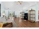 Bright living room boasting wood floors, a vaulted ceiling, and sliding glass doors with natural light at 658 Pamlico Ct., Myrtle Beach, SC 29588