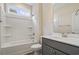 Bright bathroom with white bathtub and vanity at 716 Lapwind Loop, Myrtle Beach, SC 29579