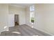 Bedroom with connecting door and window at 716 Lapwind Loop, Myrtle Beach, SC 29579