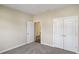 Carpeted bedroom with view to another room and closet at 716 Lapwind Loop, Myrtle Beach, SC 29579