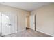 Bedroom featuring neutral carpet, paint, a closet and a door to another room at 716 Lapwind Loop, Myrtle Beach, SC 29579