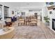 Open concept living room with fireplace, hardwood floors, and bright light at 802 46Th Ave. S, North Myrtle Beach, SC 29582