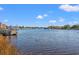 Scenic water view, showcasing boats and distant riverfront buildings against a blue sky with clouds at 805 Francis Parker Rd., Georgetown, SC 29440