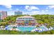 Overhead shot of resort featuring an outdoor pool area, beautiful architecture, and mature trees at 8068 Cortona Dr., Myrtle Beach, SC 29572