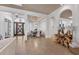 Open-concept foyer offering a view of the dining room, and a decorative front door at 8068 Cortona Dr., Myrtle Beach, SC 29572