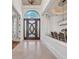 Grand foyer showcasing a decorative front door, tile flooring, and an open view to the dining room at 8068 Cortona Dr., Myrtle Beach, SC 29572