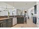 Kitchen area with stainless steel dishwasher and convenient wine cooler at 8068 Cortona Dr., Myrtle Beach, SC 29572