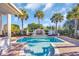 Gorgeous pool features a beautiful fountain, pristine blue water, and multiple palm trees at 8068 Cortona Dr., Myrtle Beach, SC 29572