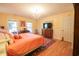 Bedroom featuring hardwood floors, chandelier, and windows with natural light at 823 Mount Gilead Place Dr., Murrells Inlet, SC 29576