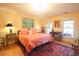 Bright bedroom featuring a chandelier, rich colors, and a classic desk at 823 Mount Gilead Place Dr., Murrells Inlet, SC 29576