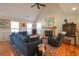 Inviting living room featuring a fireplace, hardwood floors, and a vaulted ceiling at 823 Mount Gilead Place Dr., Murrells Inlet, SC 29576