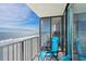 Comfortable balcony lounge chairs for relaxing and enjoying ocean views at 9400 Shore Dr. # 728, Myrtle Beach, SC 29572