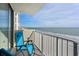 Relaxing balcony overlooking the beach featuring comfortable seating and amazing water views at 9400 Shore Dr. # 728, Myrtle Beach, SC 29572