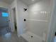 Bathroom featuring a modern, enclosed shower with matte black fixtures and bright, neutral finishes at 1001 Cavaletti Ct., Myrtle Beach, SC 29588