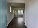 Open-concept living room showcasing hardwood floors and bright natural light at 1001 Cavaletti Ct., Myrtle Beach, SC 29588