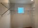 Spacious walk-in closet with metal shelving and a window for natural light at 1001 Cavaletti Ct., Myrtle Beach, SC 29588