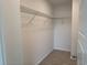 Walk-in closet with metal shelving and neutral carpet at 1001 Cavaletti Ct., Myrtle Beach, SC 29588