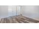 Bedroom with doors to a walk-in closet and hardwood floors at 1245 Cypress Shoal Dr., Conway, SC 29526