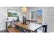 Cozy dining room featuring a wooden table with a view of the backyard, perfect for Gathering meals at 128 Shucking St., Myrtle Beach, SC 29588