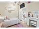 Bright bedroom with wood-look floors, white trim, and a decorative vanity at 1303 Elizabeth St., North Myrtle Beach, SC 29582