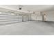 Spacious two-car garage features windows in the garage doors and an entrance into the home at 1328 Foxtail Dr., Longs, SC 29568