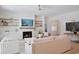 Comfortable living room with fireplace and access to another living room space at 1328 Foxtail Dr., Longs, SC 29568