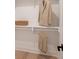 Bright walk-in closet with organized shelving, and hanging space with light wood flooring at 1328 Foxtail Dr., Longs, SC 29568