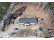 Aerial view of a home featuring a large lot, above-ground pool, and shed in the backyard at 160 Leadwood St., Andrews, SC 29510