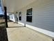 Charming home exterior featuring a covered porch and ample natural light from large windows at 160 Leadwood St., Andrews, SC 29510