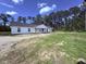 Charming single-story home featuring a bright exterior, a gravel drive and a well maintained lawn at 160 Leadwood St., Andrews, SC 29510