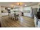 A modern kitchen featuring white cabinetry, granite countertops, and stainless steel appliances at 160 Leadwood St., Andrews, SC 29510