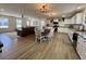 The combined living and dining area showcases a modern open layout, perfect for Gathering living at 160 Leadwood St., Andrews, SC 29510