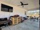 Covered patio with ceiling fan and outdoor furniture - perfect for relaxing and entertaining at 160 Leadwood St., Andrews, SC 29510