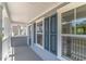 View from balcony with white columns and dark shutters at 1800 Hardwood Ct., Conway, SC 29526