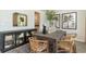 Cozy dining room featuring stylish decor, a chic cabinet, and a view to the kitchen at 1800 Hardwood Ct., Conway, SC 29526