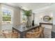 Dining room with large windows, stylish decor, and ample natural light at 1808 Hardwood Ct., Conway, SC 29526