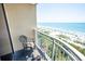 Balcony area complete with furniture overlooking the ocean at 2106 N Ocean Blvd. # 712, Myrtle Beach, SC 29577