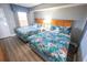 This bedroom is furnished with two beds, lamps and neutral walls at 2106 N Ocean Blvd. # 712, Myrtle Beach, SC 29577