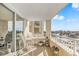 Comfortable balcony seating and sunny skies with a view of the waterway at 2151 Bridge View Ct. # 11003, North Myrtle Beach, SC 29582