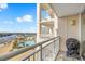 Relax on this condo balcony with views of the pool and Intracoastal Waterway at 2151 Bridge View Ct. # 11003, North Myrtle Beach, SC 29582