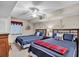 Nautical themed bedroom with two beds, ceiling fan, and window with blind at 2151 Bridge View Ct. # 11003, North Myrtle Beach, SC 29582