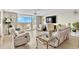 Bright and airy living room with reclining leather furniture and access to balcony at 2151 Bridge View Ct. # 11003, North Myrtle Beach, SC 29582