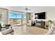 Bright and airy living room with reclining leather furniture and access to balcony at 2151 Bridge View Ct. # 11003, North Myrtle Beach, SC 29582