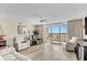 Bright and airy living room with reclining leather furniture and access to balcony at 2151 Bridge View Ct. # 11003, North Myrtle Beach, SC 29582