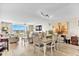 Spacious living and dining area with large windows, blending indoor comfort with scenic views at 2151 Bridge View Ct. # 11003, North Myrtle Beach, SC 29582
