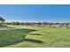 Green lawn with a view of a waterway and boats docked at the marina at 2151 Bridge View Ct. # 11003, North Myrtle Beach, SC 29582