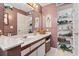 Bathroom vanity with a built in vanity, shelves, white cabinets, and modern sink at 2276 Essex Dr. # H, Surfside Beach, SC 29575