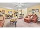 The open-plan living space includes living, dining, and kitchen areas, creating a connected feel at 2276 Essex Dr. # H, Surfside Beach, SC 29575